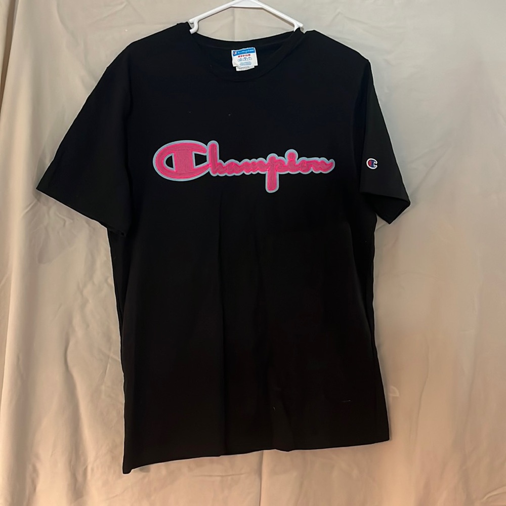 Black T shirt with Pink Champion letters